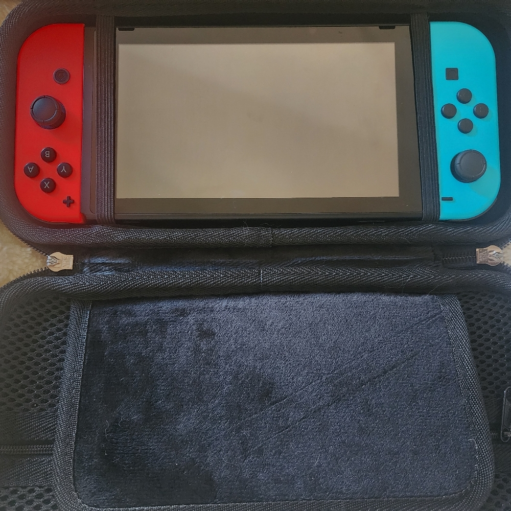 Nintendo switch, Barely Used. Works Great. Games And Case Included.